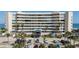 Stunning exterior view of the condo building, showcasing its design and oceanfront location at 4631 S Atlantic S Ave # 8201, Ponce Inlet, FL 32127