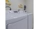 Bright laundry room featuring a modern washer and dryer set for convenient chores at 4631 S Atlantic S Ave # 8201, Ponce Inlet, FL 32127
