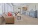 Cozy living room with tile flooring and open to the kitchen with bar stool seating at 4631 S Atlantic S Ave # 8201, Ponce Inlet, FL 32127