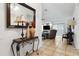 Stylish entryway with tiled flooring, decor and a view of the living room at 480 Columbus Ave, Orange City, FL 32763