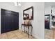 Welcoming entryway with tiled floors and an decorative console table with mirror at 480 Columbus Ave, Orange City, FL 32763