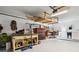 Spacious garage includes workbench and storage options, perfect for projects and organization at 480 Columbus Ave, Orange City, FL 32763