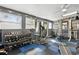 Home gym features exercise equipment, weights, ample lighting, and durable flooring at 480 Columbus Ave, Orange City, FL 32763