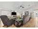 Spacious living area with tile flooring and plenty of seating at 480 Columbus Ave, Orange City, FL 32763