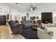 Comfortable living room featuring a fireplace, tile floors, and neutral paint at 480 Columbus Ave, Orange City, FL 32763