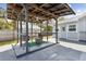 Covered patio area with an overhead shelter creating a cozy space at 480 Columbus Ave, Orange City, FL 32763