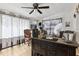 Bright sun room with western decor, rustic accents, and a unique wooden bar for entertaining at 480 Columbus Ave, Orange City, FL 32763