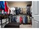 Walk-in closet with ample shelving and storage space for an organized wardrobe at 5065 Nw 35Th Pl, Ocala, FL 34482