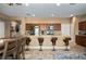 Open kitchen with a breakfast bar and stainless-steel appliances at 5065 Nw 35Th Pl, Ocala, FL 34482