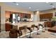 Spacious kitchen features stainless steel appliances, a large center island, and bar stool seating at 5065 Nw 35Th Pl, Ocala, FL 34482