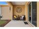 Covered outdoor patio with seating area and ceiling fan at 5065 Nw 35Th Pl, Ocala, FL 34482