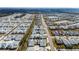 Community aerial view displaying organized streets and uniform housing development at 562 Landshark Blvd, Daytona Beach, FL 32124