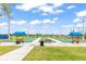 Well-maintained bocce ball courts surrounded by lush green grass for outdoor recreation at 562 Landshark Blvd, Daytona Beach, FL 32124