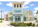 Commercial center with a Coconut Telegraph Business Center sign and colorful facades at 562 Landshark Blvd, Daytona Beach, FL 32124