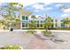 Well-maintained exterior of a fitness center with ample parking and lush landscaping at 562 Landshark Blvd, Daytona Beach, FL 32124