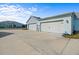Spacious three-car garage, providing ample parking and storage at 562 Landshark Blvd, Daytona Beach, FL 32124