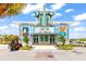 Exterior view of Last Mango Theater with vibrant signage and tropical decor at 562 Landshark Blvd, Daytona Beach, FL 32124