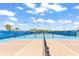 Well-maintained pickleball court with blue fencing and lighting for evening play at 562 Landshark Blvd, Daytona Beach, FL 32124