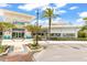 Exterior view of Latitude Bar & Chill and Changes in Attitude Bar with patio seating under blue skies at 562 Landshark Blvd, Daytona Beach, FL 32124