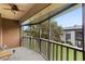 Relaxing screened-in porch with ceiling fan and view of green space at 600 N Boundary Ave # 115D, Deland, FL 32720