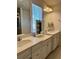 This spacious bathroom features a double vanity, bright lighting, and modern fixtures at 7024 Lanier Falls Rd, Deland, FL 32724