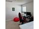 This bonus room includes desk, gaming chair, and a comfy beanbag chair at 7024 Lanier Falls Rd, Deland, FL 32724