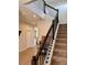 Inviting staircase with wood and carpet, leading to the upper level of the home at 7024 Lanier Falls Rd, Deland, FL 32724