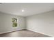 Bright bedroom with hardwood floors and natural light at 72 Aurora Ave, Ponce Inlet, FL 32127