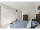 Primary bedroom with wood floors, ensuite and generous closet space at 72 Aurora Ave, Ponce Inlet, FL 32127