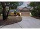 Charming single-Gathering home featuring a spacious two-car garage and inviting front porch at 725 E New York Ave, Orange City, FL 32763