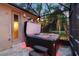 Luxurious outdoor hot tub on a screened patio, providing a private and relaxing retreat at 725 E New York Ave, Orange City, FL 32763