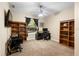 Functional home office space designed for productivity, featuring ample desk space and lots of natural light at 725 E New York Ave, Orange City, FL 32763