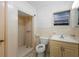 Simple bathroom with shower stall, tile floor and neutral color scheme at 753 Glenwood Rd, Deland, FL 32720