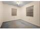 Standard bedroom with a ceiling fan and two windows at 753 Glenwood Rd, Deland, FL 32720