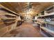 Interior of the shed, featuring ample shelving and workspaces, perfect for hobbies or storage at 753 Glenwood Rd, Deland, FL 32720