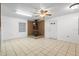 Living room with wood burning stove and tile flooring, offering a cozy and durable space at 753 Glenwood Rd, Deland, FL 32720