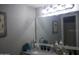 Bathroom vanity with double sinks and updated fixtures and decor at 1101 Monticello Ln # 3, Port Orange, FL 32129
