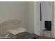 Bedroom with twin bed, laminate floors, and a closet with sliding doors at 1101 Monticello Ln # 3, Port Orange, FL 32129