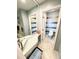 Bathroom with a large mirror, dressing table, and separate toilet room at 112 Muscovy Ct, Daytona Beach, FL 32119