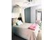 Bedroom features a large mirrored closet, canopy bed, and gray carpet at 112 Muscovy Ct, Daytona Beach, FL 32119