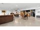 Open basement featuring a bar with barrel accents, pool table, and concrete flooring at 12736 Lake Ridge Cir, Clermont, FL 34711
