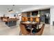 Basement with a rustic-style bar, pool table, and game table provides ample entertainment options at 12736 Lake Ridge Cir, Clermont, FL 34711