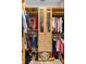 Spacious walk-in closet with ample storage, custom shelving, drawers, and hanging racks at 12736 Lake Ridge Cir, Clermont, FL 34711