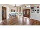 Bright and airy living room showcasing hardwood floors and a stylish seating arrangement at 12736 Lake Ridge Cir, Clermont, FL 34711