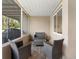 Relaxing screened-in patio with comfortable seating, perfect for enjoying the outdoors in any weather at 12736 Lake Ridge Cir, Clermont, FL 34711