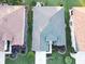 Aerial view of a single Gathering house showing roof, landscaping, and driveway at 12841 Se 97Th Terrace Rd, Summerfield, FL 34491