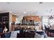 Inviting living room seamlessly connects to the kitchen, perfect for gatherings and everyday living at 12841 Se 97Th Terrace Rd, Summerfield, FL 34491
