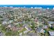 Neighborhood aerial view shows well-maintained homes in a residential community near the coast at 13 Sandcastle Dr, Ormond Beach, FL 32176