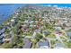 An aerial view of a charming home nestled in a quiet residential neighborhood near the water at 13 Sandcastle Dr, Ormond Beach, FL 32176