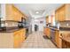 Spacious kitchen with stainless steel appliances, granite countertops, and ample cabinet space at 13 Sandcastle Dr, Ormond Beach, FL 32176